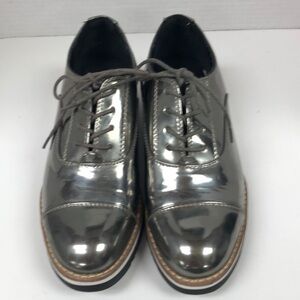 Limelight “Dandee” Silver Platform Shoes